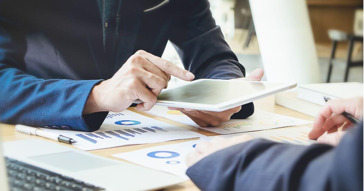 business leaders calculating the ROI of a staffing partner